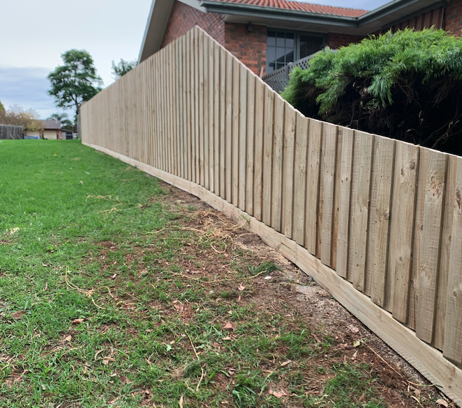 Fence after restoration—refinished and sealed